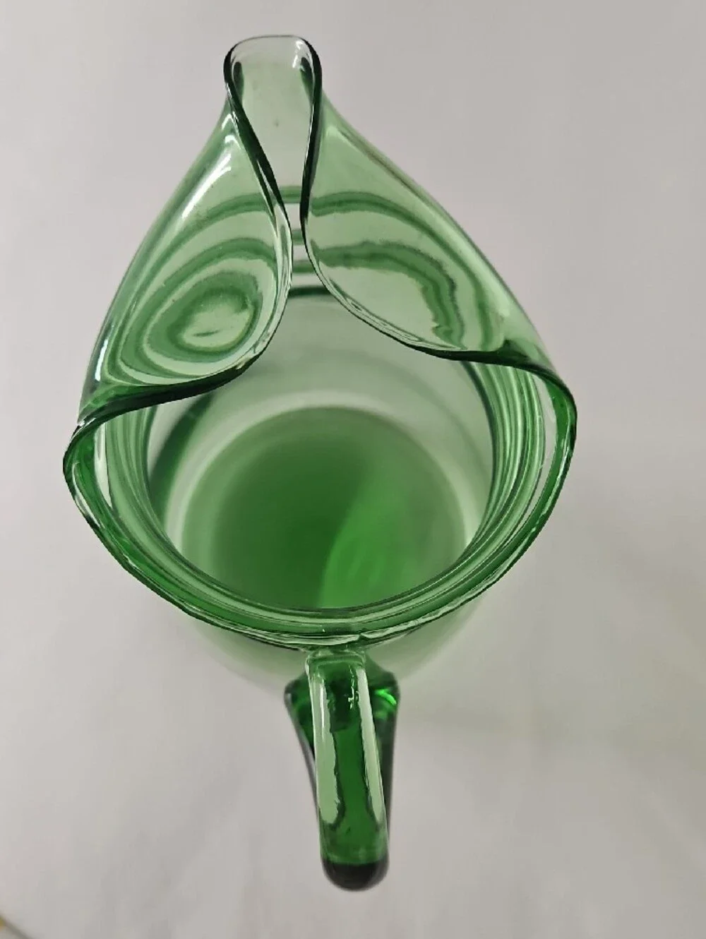 Green Glass Pitcher with Curved Handle